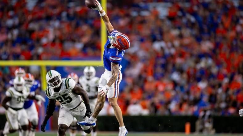 Florida Gators wide receiver Ricky Pearsall (1) makes a one-handed catch for a first down during the first half against the Charlotte 49ers at Steve Spurrier Field at Ben Hill Griffin Stadium in Gainesville, FL on Saturday, September 23, 2023. [Matt Pendleton/Gainesville Sun]