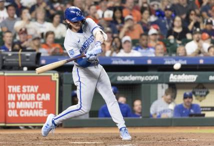 Sep 23, 2023; Houston, Texas, USA; Kansas City Royals shortstop Bobby Witt Jr. (7) hits a single against the Houston Astros in the fifth inning at Minute Maid Park. Mandatory Credit: Thomas Shea-USA TODAY Sports