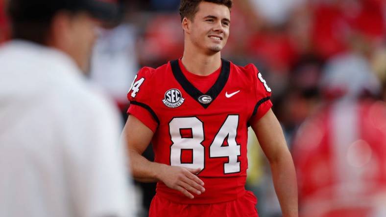 Georgia wide receiver Ladd McConkey (84) looks on during warm ups before the start of the Bulldogs' game against UAB in Athens, Ga., on Saturday, Sept. 23, 2023.