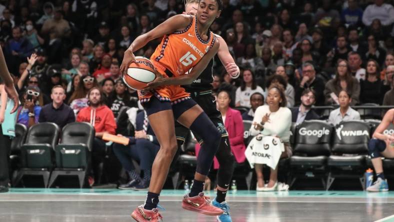 Sep 24, 2023; Brooklyn, New York, USA; Connecticut Sun guard Tiffany Hayes (15) drives to the basket in the second quarter against the New York Liberty during game one of the 2023 WNBA Playoffs at Barclays Center. Mandatory Credit: Wendell Cruz-USA TODAY Sports