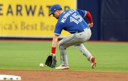 Sep 24, 2023; St. Petersburg, Florida, USA; Toronto Blue Jays second baseman Whit Merrifield (15) fields the ball against the Tampa Bay Rays during the first inning   at Tropicana Field. Mandatory Credit: Kim Klement Neitzel-USA TODAY Sports