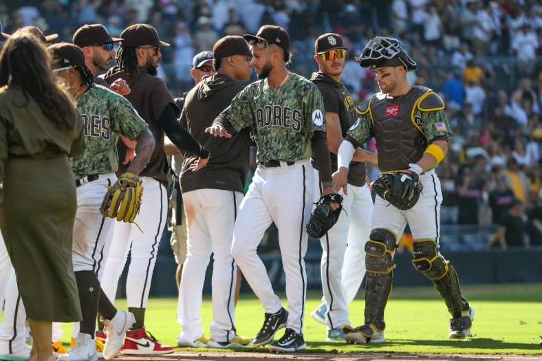 Sep 24, 2023; San Diego, California, USA;  San Diego Padres relief pitcher Jose Espada(40) celebrates with teammates after the San Diego Padres defeat the St. Louis Cardinals 12-2 at Petco Park. Mandatory Credit: David Frerker-USA TODAY Sports