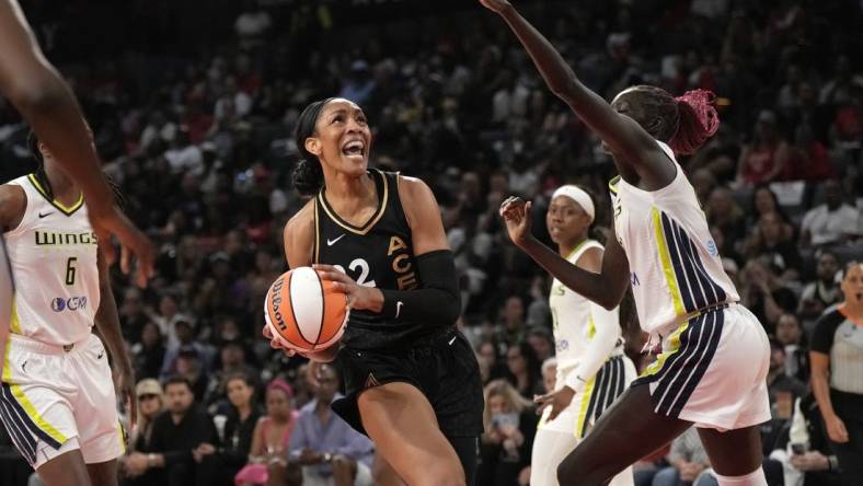 Sep 24, 2023; Las Vegas, Nevada, USA; Las Vegas Aces center A'ja Wilson (22) looks for a clear shot during the second half of game one of the 2023 WNBA Playoffs at Michelob Ultra Arena. Mandatory Credit: Kirby Lee-USA TODAY Sports