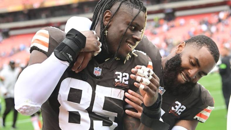 Sep 24, 2023; Cleveland, Ohio, USA; Cleveland Browns tight end David Njoku (85) and linebacker Anthony Walker Jr. (5) celebrate after the Browns beat the Tennessee Titans at Cleveland Browns Stadium. Mandatory Credit: Ken Blaze-USA TODAY Sports