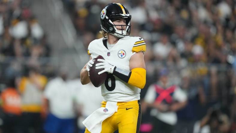 Sep 24, 2023; Paradise, Nevada, USA;  Pittsburgh Steelers quarterback Kenny Pickett (8) throws the ball against the Las Vegas Raiders in the first half at Allegiant Stadium. Mandatory Credit: Kirby Lee-USA TODAY Sports