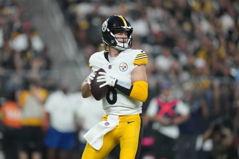 Sep 24, 2023; Paradise, Nevada, USA;  Pittsburgh Steelers quarterback Kenny Pickett (8) throws the ball against the Las Vegas Raiders in the first half at Allegiant Stadium. Mandatory Credit: Kirby Lee-USA TODAY Sports