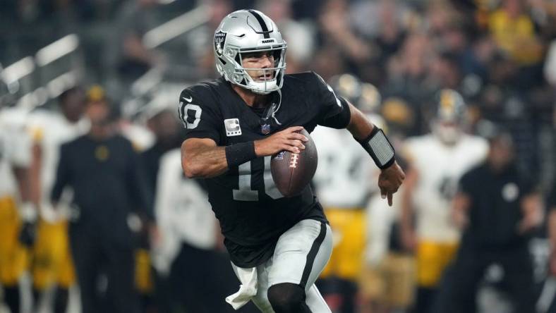 Sep 24, 2023; Paradise, Nevada, USA; Las Vegas Raiders quarterback Jimmy Garoppolo (10) throws the ball against the Pittsburgh Steelers in the second half at Allegiant Stadium. Mandatory Credit: Kirby Lee-USA TODAY Sports