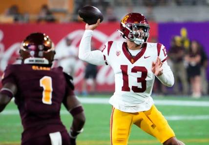 USC Trojans quarterback Caleb Williams (13) throws a pass against the Arizona State Sun Devils in the first half at Mountain America Stadium in Tempe on Sept. 23, 2023.