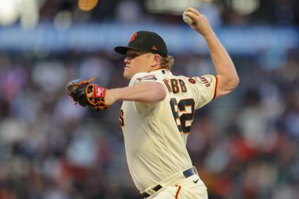 Sep 25, 2023; San Francisco, California, USA; San Francisco Giants starting pitcher Logan Webb (62) pitches during the first inning against the San Diego Padres at Oracle Park. Mandatory Credit: Sergio Estrada-USA TODAY Sports