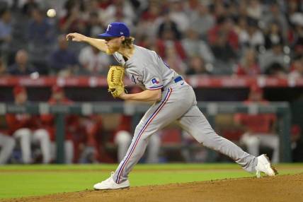 Sep 25, 2023; Anaheim, California, USA; Texas Rangers starting pitcher Jon Gray (22) pitches in the second inning against the Los Angeles Angels at Angel Stadium. Mandatory Credit: Jayne Kamin-Oncea-USA TODAY Sports