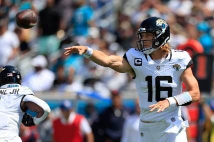 Jacksonville Jaguars quarterback Trevor Lawrence (16) passes the ball during the first quarter of an NFL football matchup Sunday, Sept. 24, 2023 at EverBank Stadium in Jacksonville, Fla. The Houston Texans defeated the Jacksonville Jaguars 37-17. [Corey Perrine/Florida Times-Union]