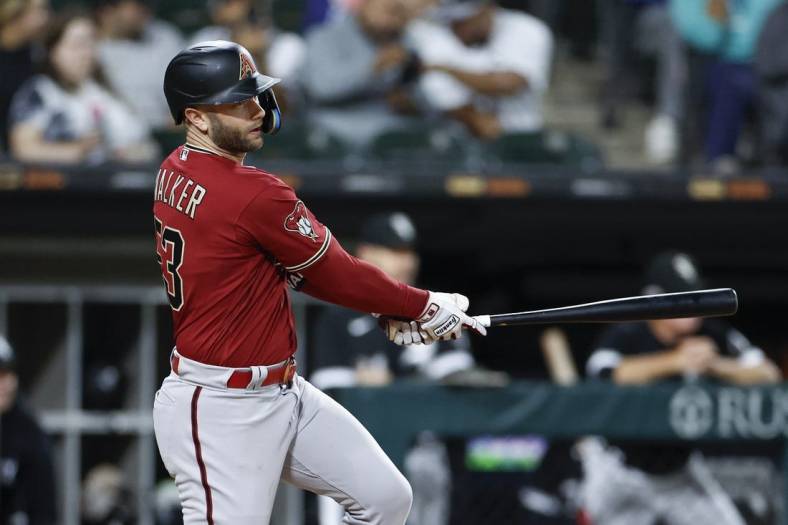 Sep 26, 2023; Chicago, Illinois, USA; Arizona Diamondbacks first baseman Christian Walker (53) hits a three-run triple against the Chicago White Sox during the fifth inning at Guaranteed Rate Field. Mandatory Credit: Kamil Krzaczynski-USA TODAY Sports