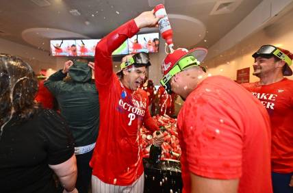 Sep 26, 2023; Philadelphia, Pennsylvania, USA; The Philadelphia Phillies celebrate in the locker room after the game against the Pittsburgh Pirates at Citizens Bank Park. Mandatory Credit: Kyle Ross-USA TODAY Sports