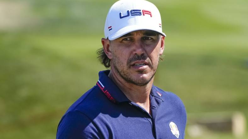 Sep 27, 2023; Rome, ITA; Team USA golfer Brooks Koepka walks to the eighth tee during a practice day for the Ryder Cup golf competition at Marco Simone Golf and Country Club. Mandatory Credit: Adam Cairns-USA TODAY Sports