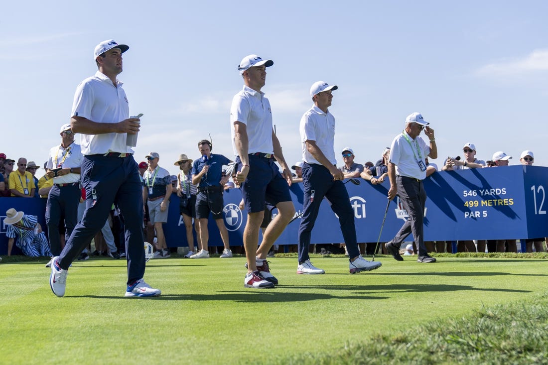 Sep 28, 2023; Rome, ITA; From left, Team USA golfers Scottie Scheffler, Justin Thomas, Jordan Spieth and Thomas    dad, Mike Thomas, walk the 12th hole during a practice day for the Ryder Cup golf competition at Marco Simone Golf and Country Club. Mandatory Credit: Adam Cairns-USA TODAY Sports