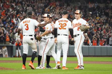 Sep 28, 2023; Baltimore, Maryland, USA; The Baltimore Orioles celebrate clinching the American League East Division after winning the game against the Boston Red Sox at Oriole Park at Camden Yards. Mandatory Credit: Gregory Fisher-USA TODAY Sports