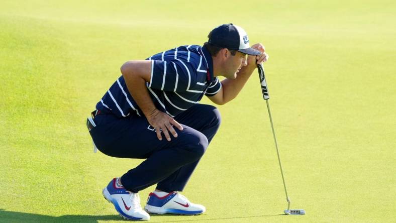 Sep 29, 2023; Rome, ITA; Team USA golfer Scottie Scheffler prepares to putt on the eighth hole during day one foursomes round for the 44th Ryder Cup golf competition at Marco Simone Golf and Country Club. Mandatory Credit: Kyle Terada-USA TODAY Sports