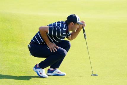 Sep 29, 2023; Rome, ITA; Team USA golfer Scottie Scheffler prepares to putt on the eighth hole during day one foursomes round for the 44th Ryder Cup golf competition at Marco Simone Golf and Country Club. Mandatory Credit: Kyle Terada-USA TODAY Sports