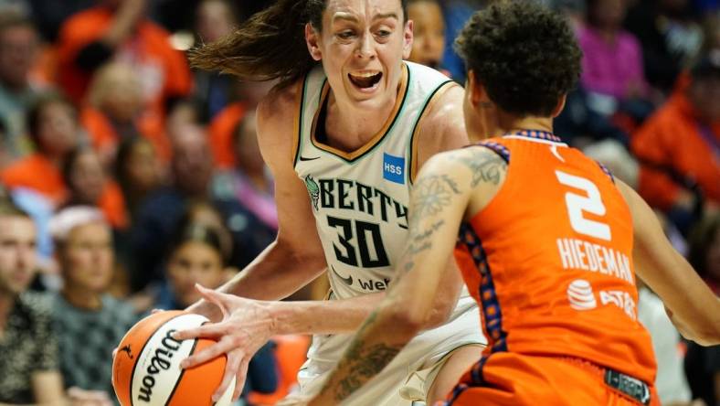 Sep 29, 2023; Uncasville, Connecticut, USA; New York Liberty forward Breanna Stewart (30) drives the ball against Connecticut Sun guard Natisha Hiedeman (2) in the second quarter during game three of the 2023 WNBA Playoffs at Mohegan Sun Arena. Mandatory Credit: David Butler II-USA TODAY Sports