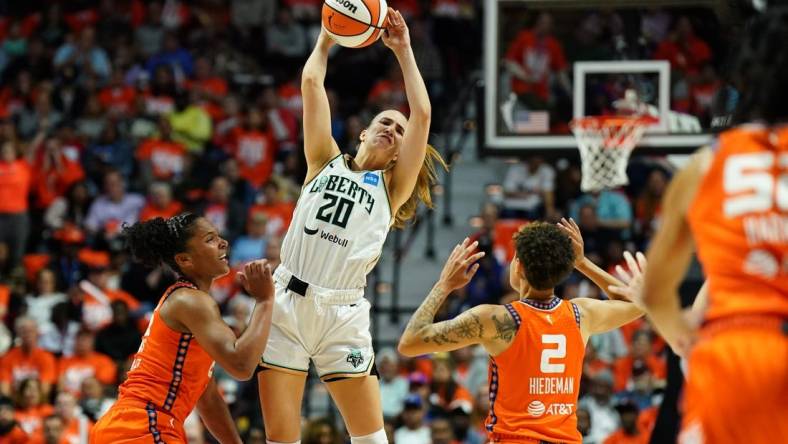 Sep 29, 2023; Uncasville, Connecticut, USA; New York Liberty guard Sabrina Ionescu (20) passes the ball against Connecticut Sun forward Alyssa Thomas (25) in the first half during game three of the 2023 WNBA Playoffs at Mohegan Sun Arena. Mandatory Credit: David Butler II-USA TODAY Sports