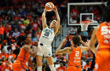 Sep 29, 2023; Uncasville, Connecticut, USA; New York Liberty guard Sabrina Ionescu (20) passes the ball against Connecticut Sun forward Alyssa Thomas (25) in the first half during game three of the 2023 WNBA Playoffs at Mohegan Sun Arena. Mandatory Credit: David Butler II-USA TODAY Sports