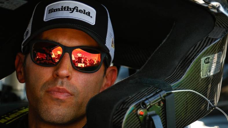 Sep 30, 2023; Talladega, Alabama, USA; NASCAR Cup Series driver Aric Almirola (10) looks on during qualifying for the YellaWood 500 at Talladega Superspeedway. Mandatory Credit: Douglas DeFelice-USA TODAY Sports