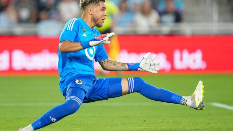 Sep 30, 2023; Saint Paul, Minnesota, USA; Minnesota United goalkeeper Dayne St. Clair (97) dives against the San Jose Earthquakes in the first half at Allianz Field. Mandatory Credit: Matt Blewett-USA TODAY Sports