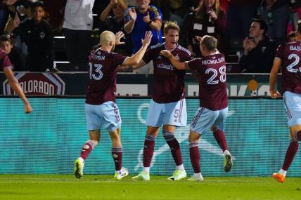 Sep 30, 2023; Commerce City, Colorado, USA; Colorado Rapids defender Andreas Maxs   (5) celebrates his goal with defender Andrew Gutman (13) and midfielder Sam Nicholson (28) in the first half against the Austin FC at Dick's Sporting Goods Park. Mandatory Credit: Ron Chenoy-USA TODAY Sports
