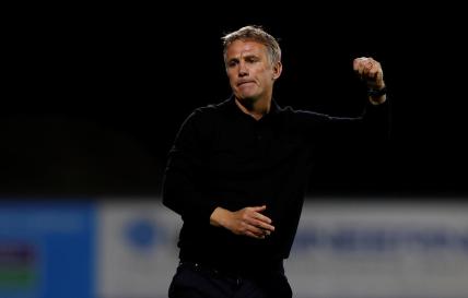 Wrexham manager Phil Parkinson celebrates winning a penalty shootout against Wigan Athletic at the Racecourse Ground in Wrexham, Wales, Britain on Aug. 8, 2023. (Action Images/Jason Cairnduff)