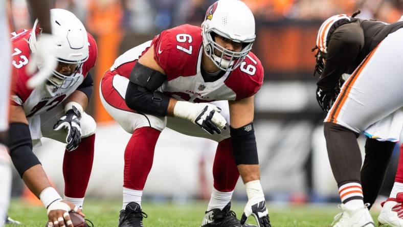 Oct 17, 2021; Cleveland, Ohio, USA; Arizona Cardinals guard Justin Pugh (67) at the line of scrimmage against the Cleveland Browns during the second quarter at FirstEnergy Stadium. Mandatory Credit: Scott Galvin-USA TODAY Sports