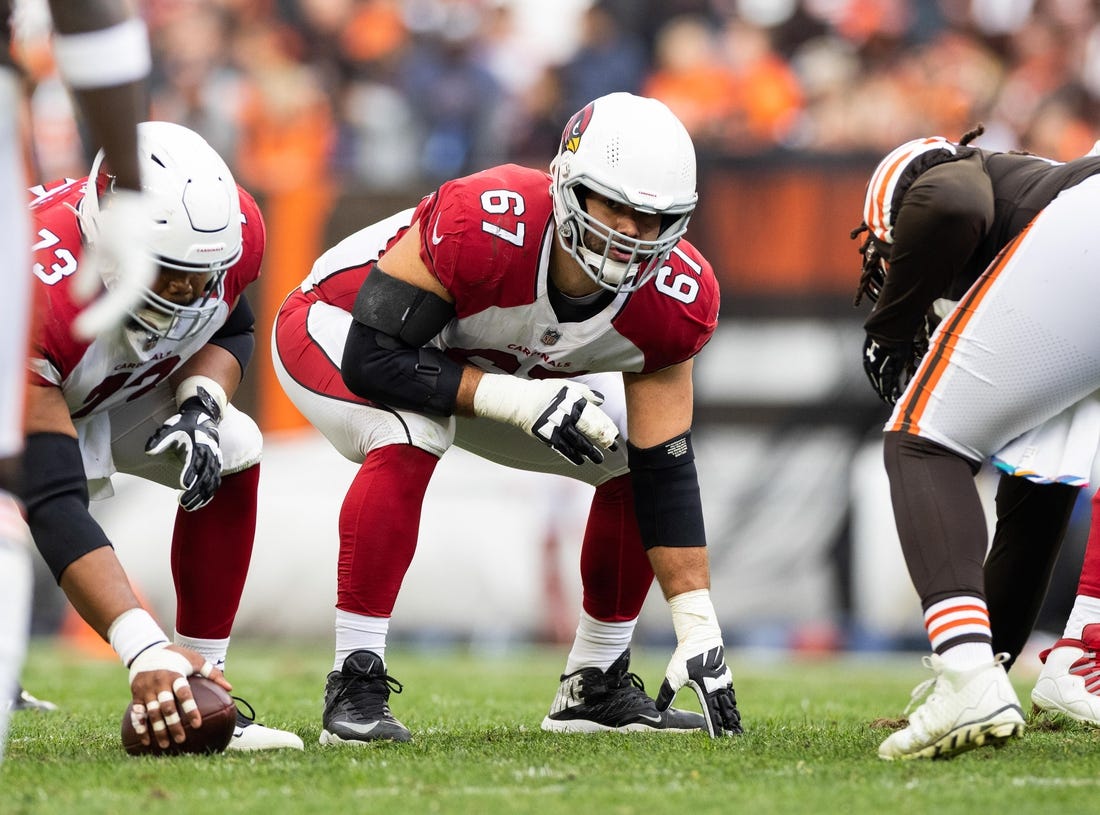 Oct 17, 2021; Cleveland, Ohio, USA; Arizona Cardinals guard Justin Pugh (67) at the line of scrimmage against the Cleveland Browns during the second quarter at FirstEnergy Stadium. Mandatory Credit: Scott Galvin-USA TODAY Sports