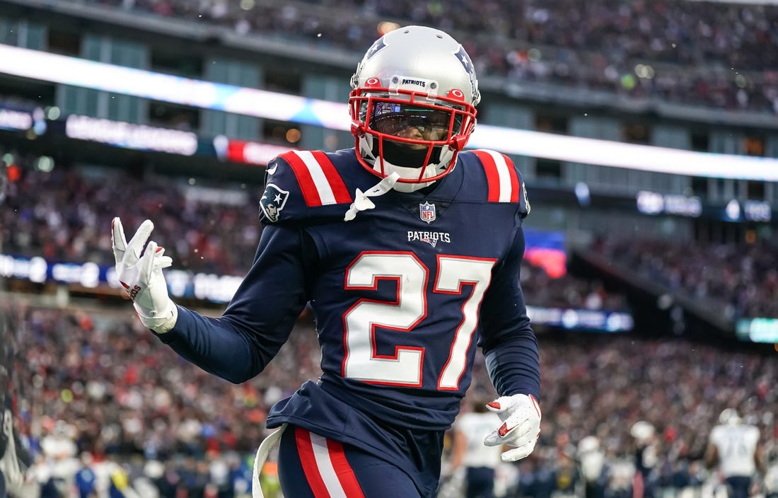 Nov 28, 2021; Foxborough, Massachusetts, USA; New England Patriots cornerback J.C. Jackson (27) reacts after intercepting a pass in the Tennessee Titans end zone in the second half at Gillette Stadium. Mandatory Credit: David Butler II-USA TODAY Sports