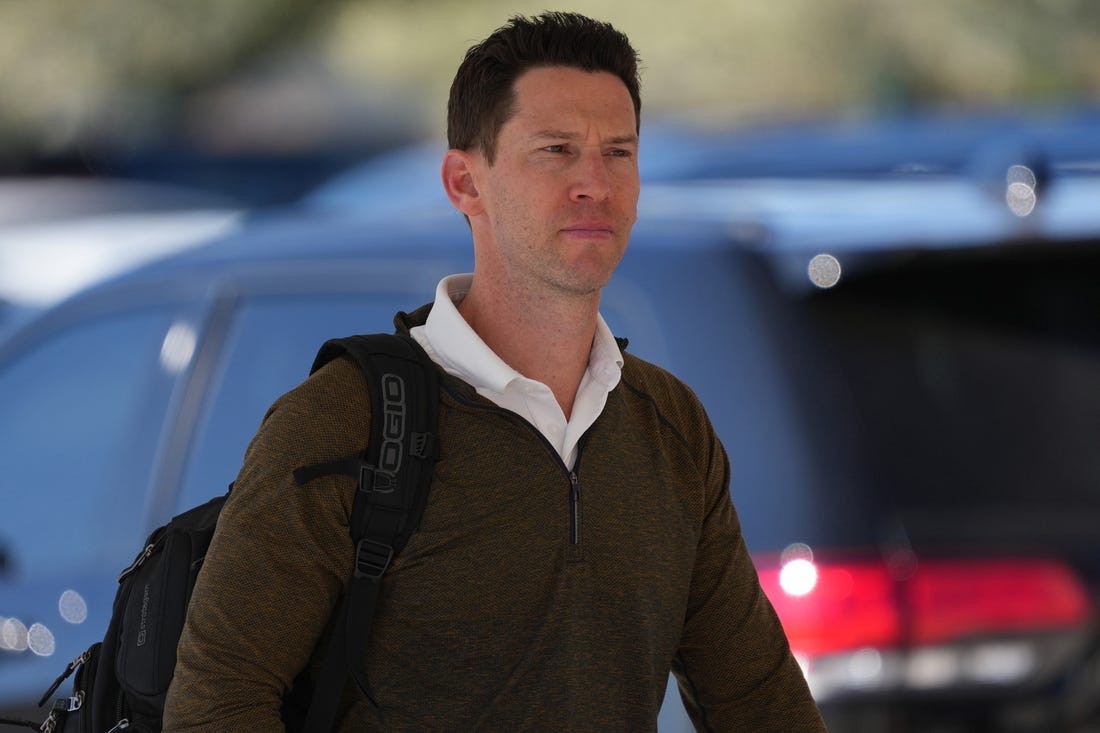 Mar 12, 2022; Mesa, AZ, USA; Chicago Cubs assistant general manager Craig Breslow arrives during a spring training workout at Sloan Park. Mandatory Credit: Joe Camporeale-USA TODAY Sports