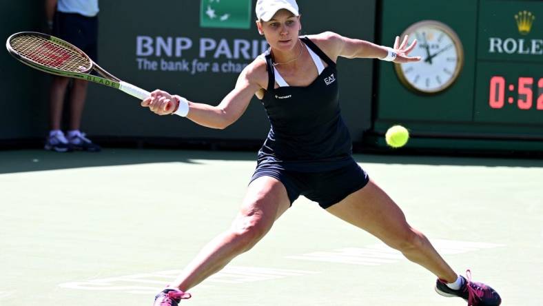 Mar 17, 2022; Indian Wells, CA, USA;   Veronika Kudermetova (RUS) hits a shot against Paula Badosa (ESP) at the BNP Paribas Open at the Indian Wells Tennis Garden. Mandatory Credit: Jayne Kamin-Oncea-USA TODAY Sports