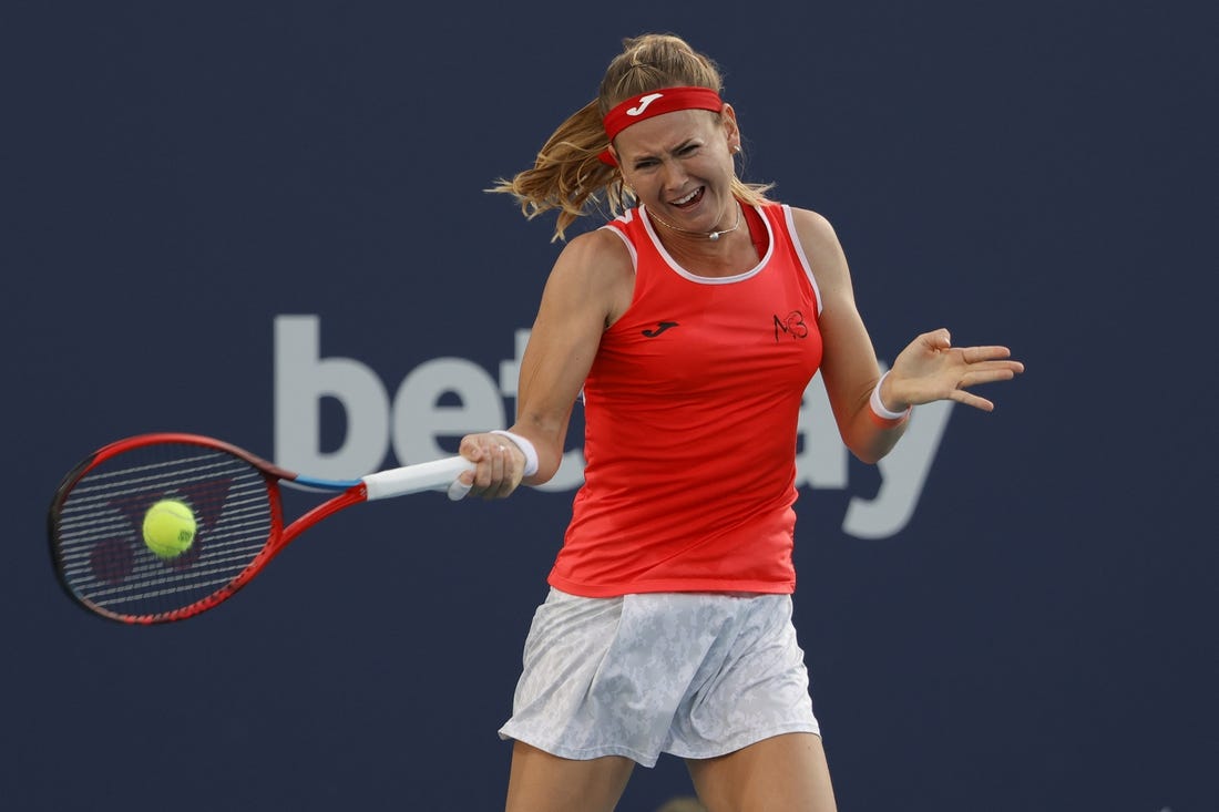 Mar 25, 2022; Miami Gardens, FL, USA; Marie Bouzkova (CZE) hits a forehand against Paula Badosa (ESP) (not pictured) in a second round women's match in the Miami Open at Hard Rock Stadium. Mandatory Credit: Geoff Burke-USA TODAY Sports