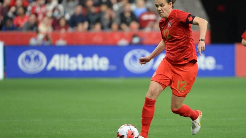 Apr 8, 2022; Vancouver, BC, Canada;  Women's Canadian National forward Christine Sinclair (12) controls the ball against Women's Nigeria National team during the first half at BC Place. Mandatory Credit: Anne-Marie Sorvin-USA TODAY Sports