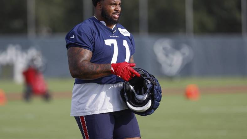 Jun 15, 2022; Houston, TX, USA; Houston Texans offensive lineman Tytus Howard (71) participates in drills during minicamp at Houston Methodist Training Center. Mandatory Credit: Troy Taormina-USA TODAY Sports