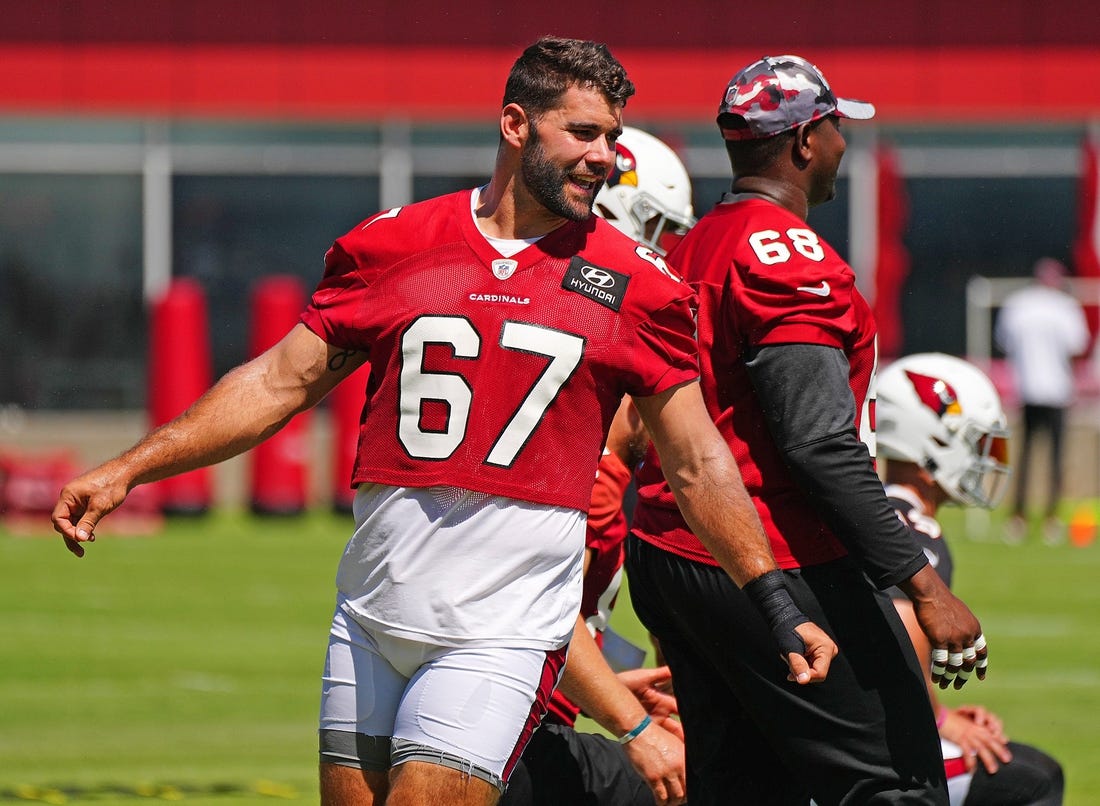 June 15, 2022; Tempe, Arizona; USA; Cardinals offensive lineman Justin Pugh warms up during camp at the Tempe Training facility.

Nfl Cardinals Mandatory Camp At Arizona Cardinals