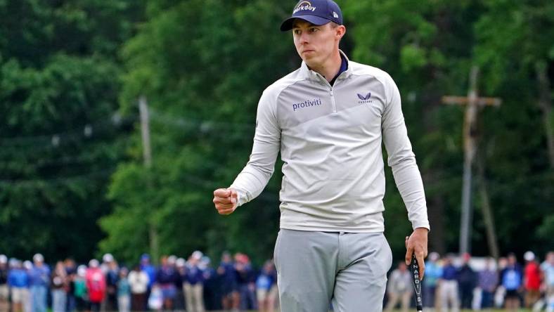 Jun 19, 2022; Brookline, Massachusetts, USA; Matthew Fitzpatrick reacts to his putt on the 15th green during the final round of the U.S. Open golf tournament. Mandatory Credit: Peter Casey-USA TODAY Sports