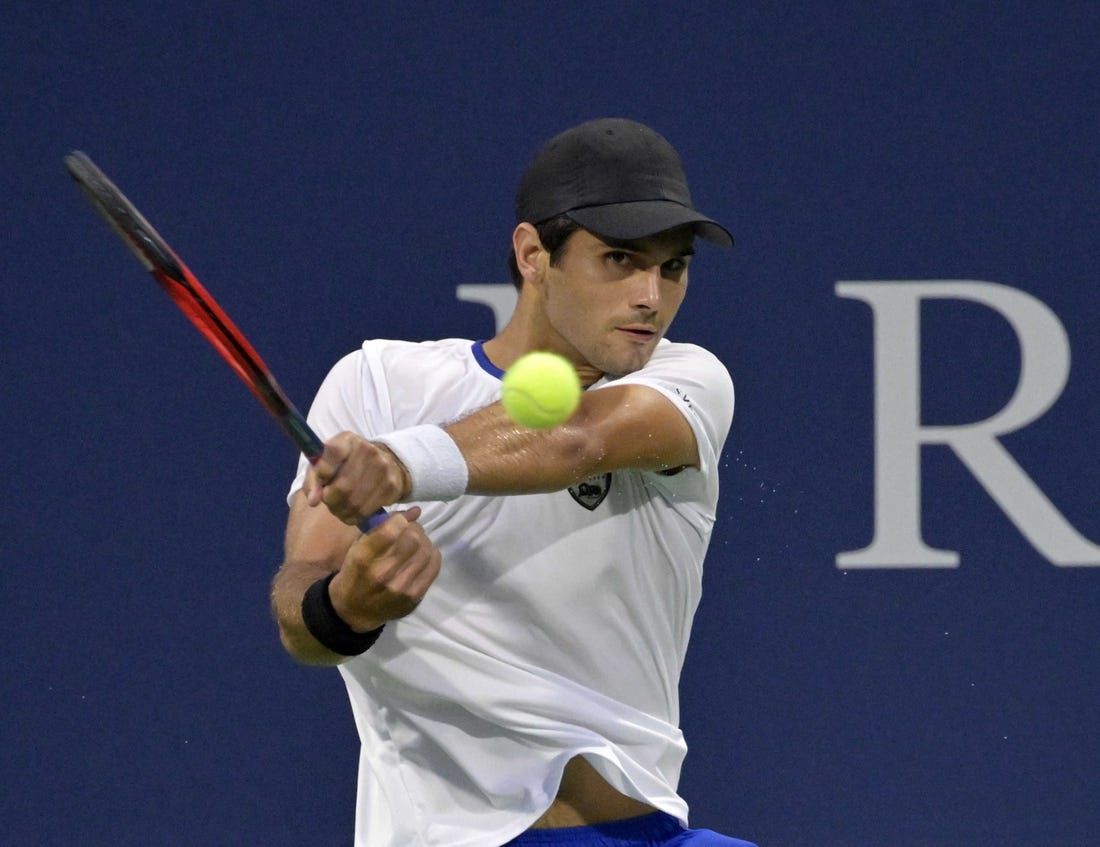 Aug 8, 2022; Montreal, QC, Canada; Marcos Giron (USA) hits a backhand against Roberto Bautista Agut (ESP) (not pictured) in first round play in the National Bank Open at IGA Stadium. Mandatory Credit: Eric Bolte-USA TODAY Sports