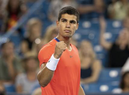 Aug 19, 2022; Cincinnati, OH, USA; Carlos Alcaraz (ESP) reacts to a point during his match against Cameron Norrie (GBR) at the Western & Southern Open at the Lindner Family Tennis Center. Mandatory Credit: Susan Mullane-USA TODAY Sports