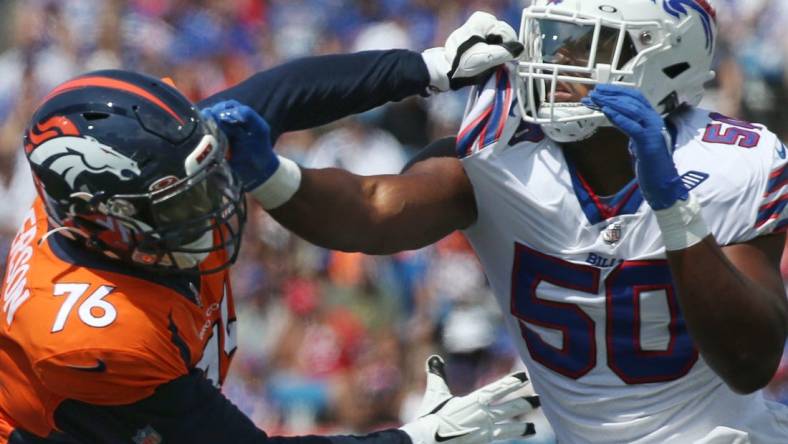 Bills edge Greg Rousseau (50), right, pushes aside Denver tackle Calvin Anderson (76) in the first half during the Bills preseason game against Denver Saturday, Aug. 20, 2022 at Highmark Stadium.

Sd 082022 Bills 87 Spts