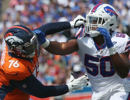 Bills edge Greg Rousseau (50), right, pushes aside Denver tackle Calvin Anderson (76) in the first half during the Bills preseason game against Denver Saturday, Aug. 20, 2022 at Highmark Stadium.

Sd 082022 Bills 87 Spts