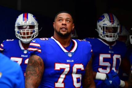 Sep 8, 2022; Inglewood, California, USA; Buffalo Bills guard Rodger Saffold (76) entire the field in the game against the Los Angeles Rams at SoFi Stadium. Mandatory Credit: Gary A. Vasquez-USA TODAY Sports