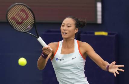 Oct 13, 2022; San Diego, California, US;  Qinwen Zheng of China hits the ball against Iga Swiatek of Poland during the San Diego Open at Barnes Tennis Center. Mandatory Credit: Ray Acevedo-USA TODAY Sports