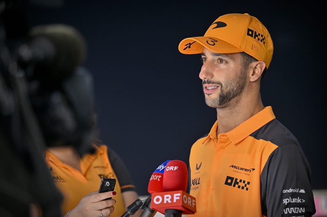 Oct 22, 2022; Austin, Texas, USA; F1 driver Daniel Ricciardo is interviewed after the qualifying session for the U.S. Grand Prix at Circuit of the Americas. Mandatory Credit: Jerome Miron-USA TODAY Sports