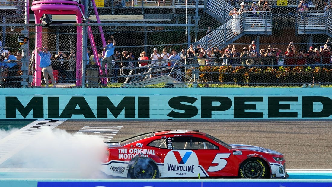 Oct 23, 2022; Homestead, Florida, USA; NASCAR Cup Series driver Kyle Larson (5) celebrates winning the Dixie Vodka 400 at Homestead-Miami Speedway. Mandatory Credit: John David Mercer-USA TODAY Sports