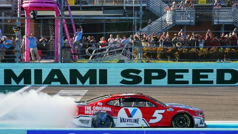 Oct 23, 2022; Homestead, Florida, USA; NASCAR Cup Series driver Kyle Larson (5) celebrates winning the Dixie Vodka 400 at Homestead-Miami Speedway. Mandatory Credit: John David Mercer-USA TODAY Sports