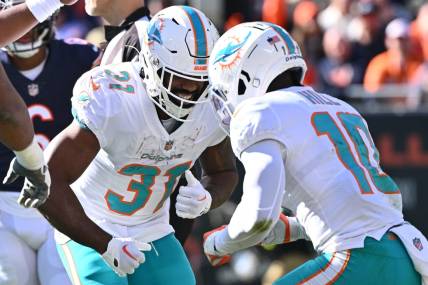 Miami Dolphins running back Raheem Mostert (31) and wide receiver Tyreek Hill (10) are back at practice. Mandatory Credit: Jamie Sabau-USA TODAY Sports