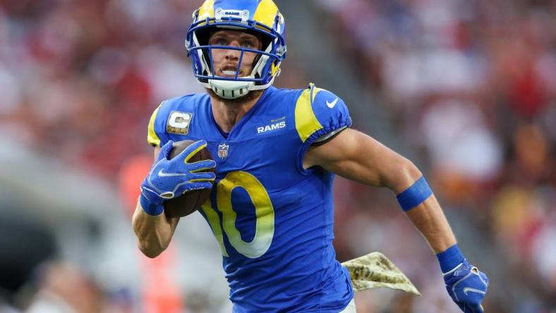 Nov 6, 2022; Tampa, Florida, USA;  Los Angeles Rams wide receiver Cooper Kupp (10) runs for a touchdown against the Tampa Bay Buccaneers in the second quarter at Raymond James Stadium. Mandatory Credit: Nathan Ray Seebeck-USA TODAY Sports